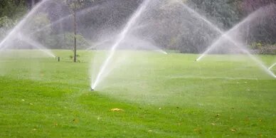 Lawn sprinklers running during an inspection